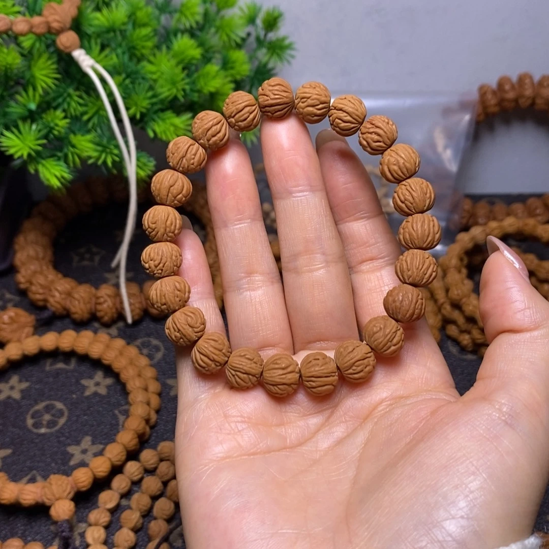 吴***祖桃核手串秦岭桃核