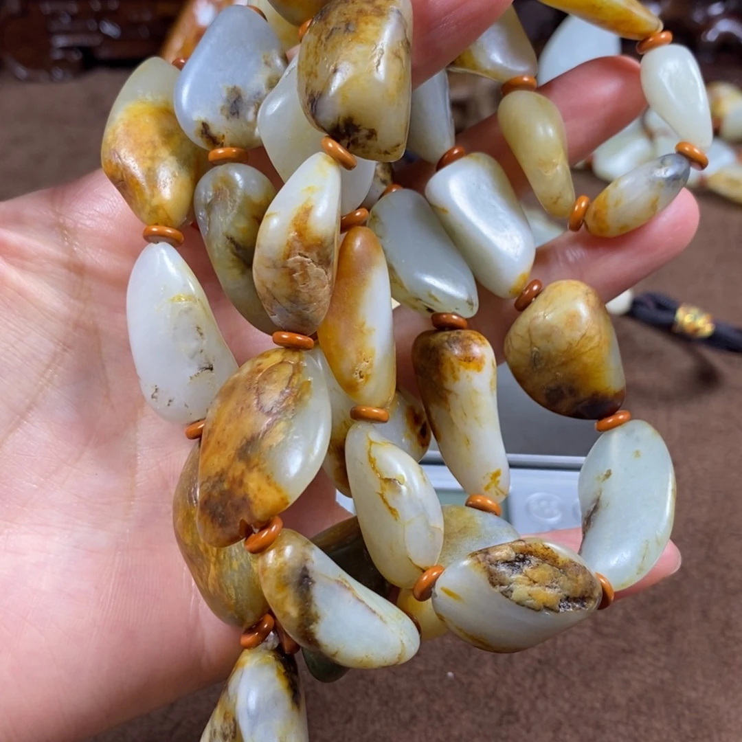 雨***彩和田玉未镶嵌把件