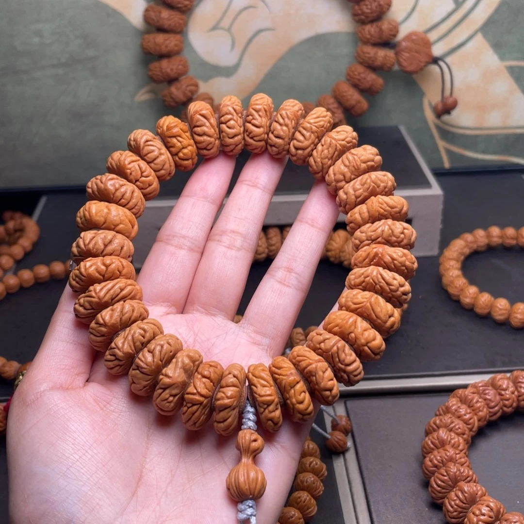 蓝***湾桃核吊坠21祥云纽扣