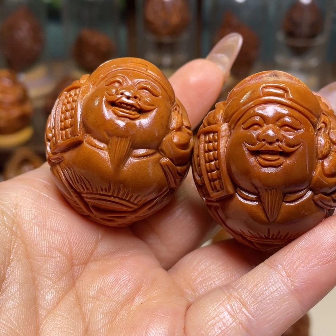 橄榄核吊坠达*荷叶财神一对