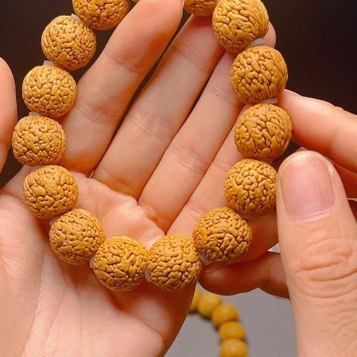 用***来吊坠桃核桃核手串