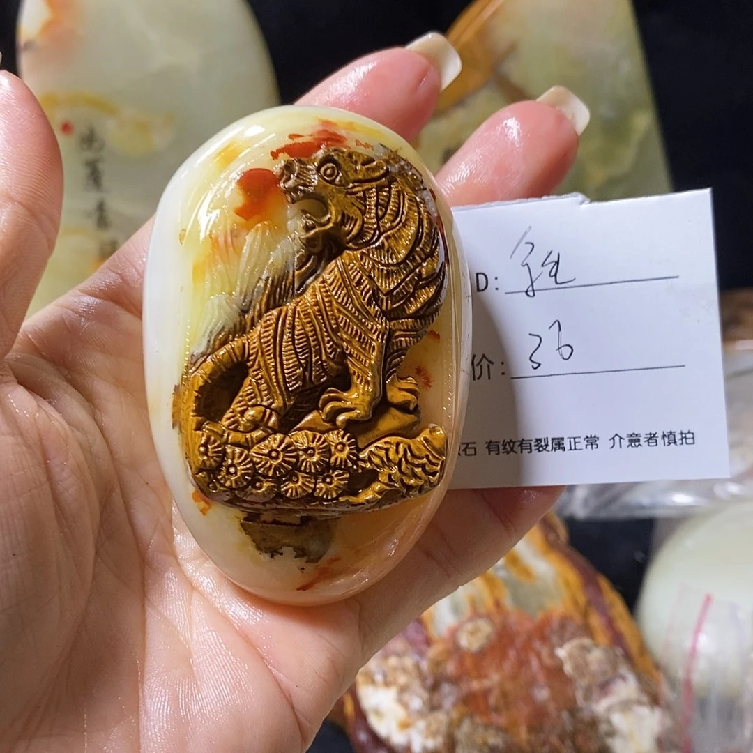 石材余***?古青石手把件