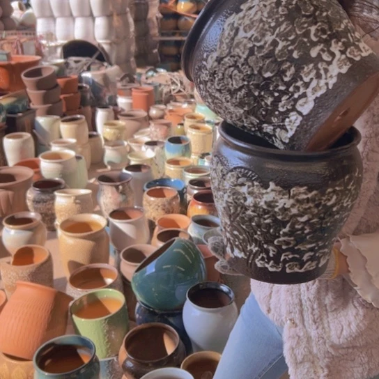 紫砂花盆高20口20。