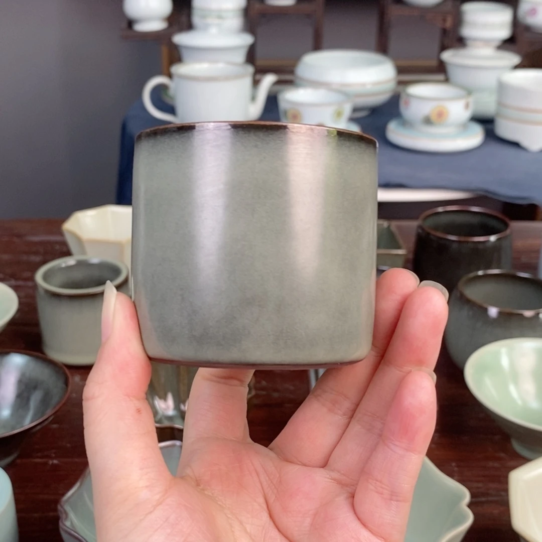 铁胎豆青板指杯开片