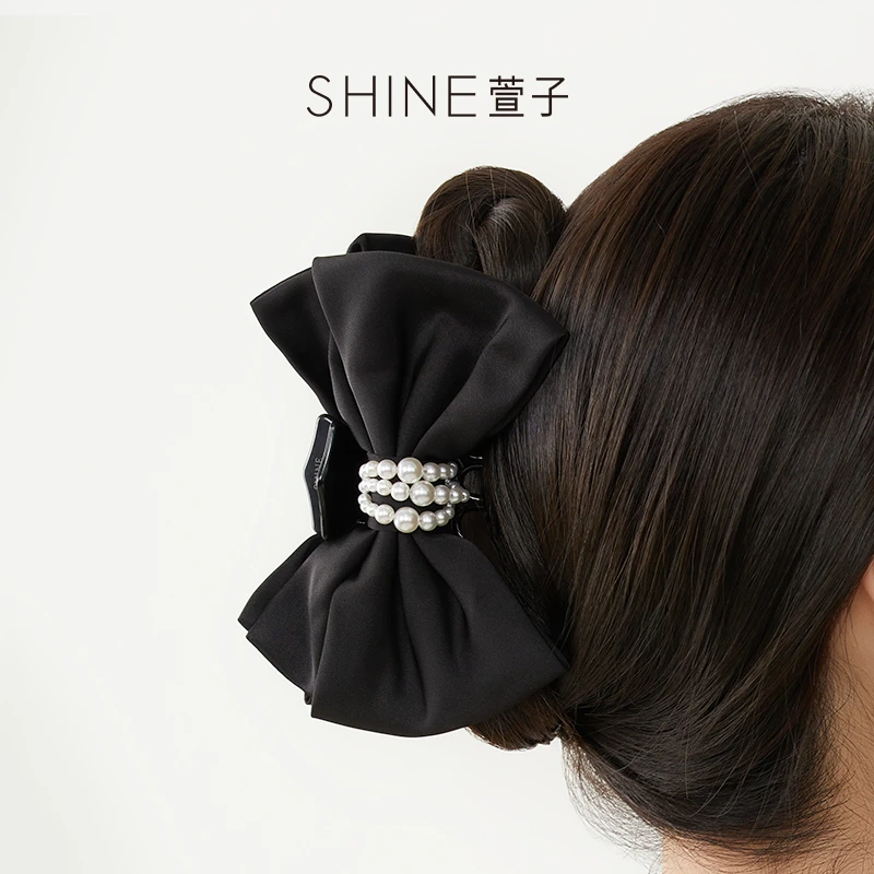 萱子SHINE黑色优雅蝴蝶结布艺抓夹