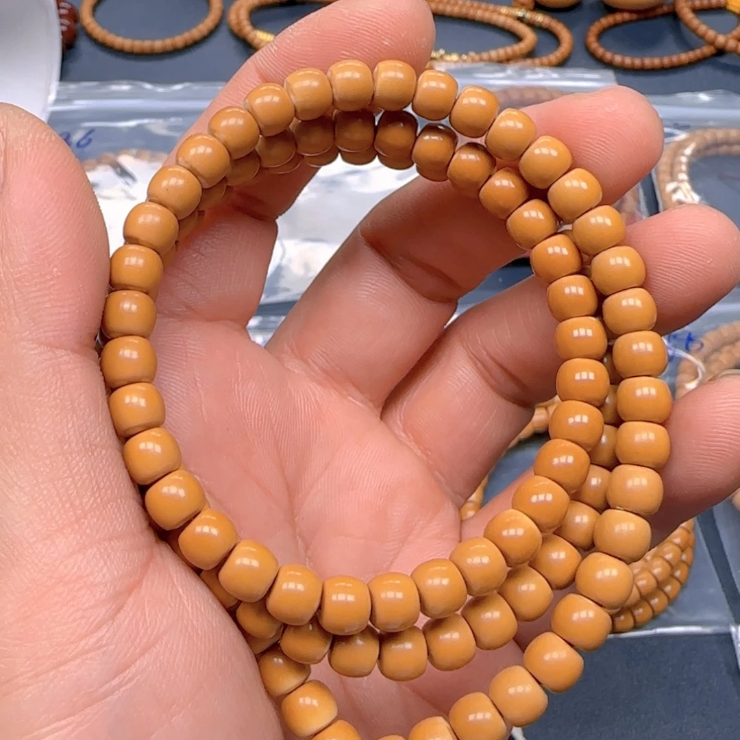 奋***)橄榄核手串老挝SS级核尖极限弧尺寸6.7