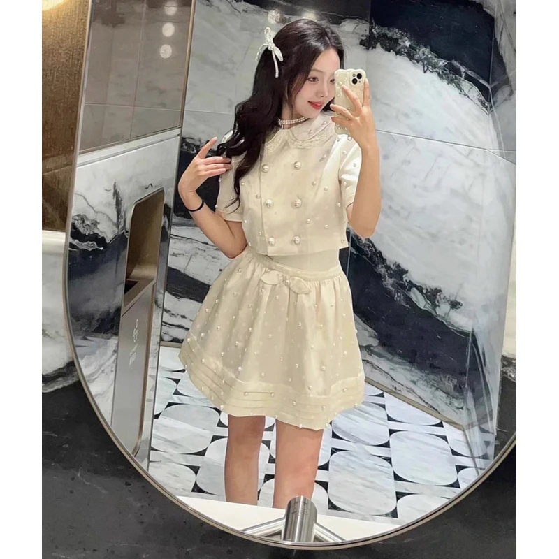 N退NO换法式甜美白色波点珍珠娃娃领珠光段短袖上衣+蓬蓬半裙套装