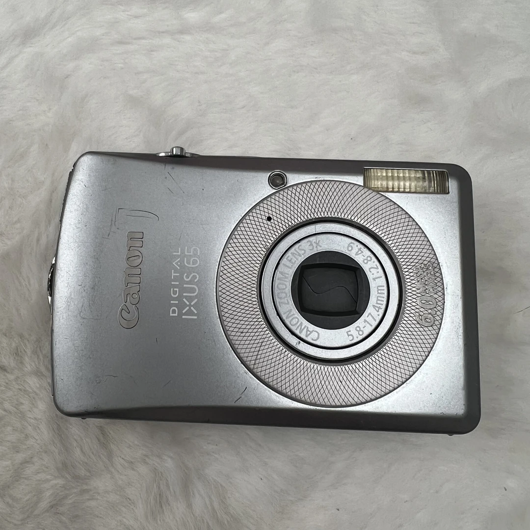 95新 Canon/佳能 ixus65特价 人白景浓闭眼入配件齐全3倍变焦