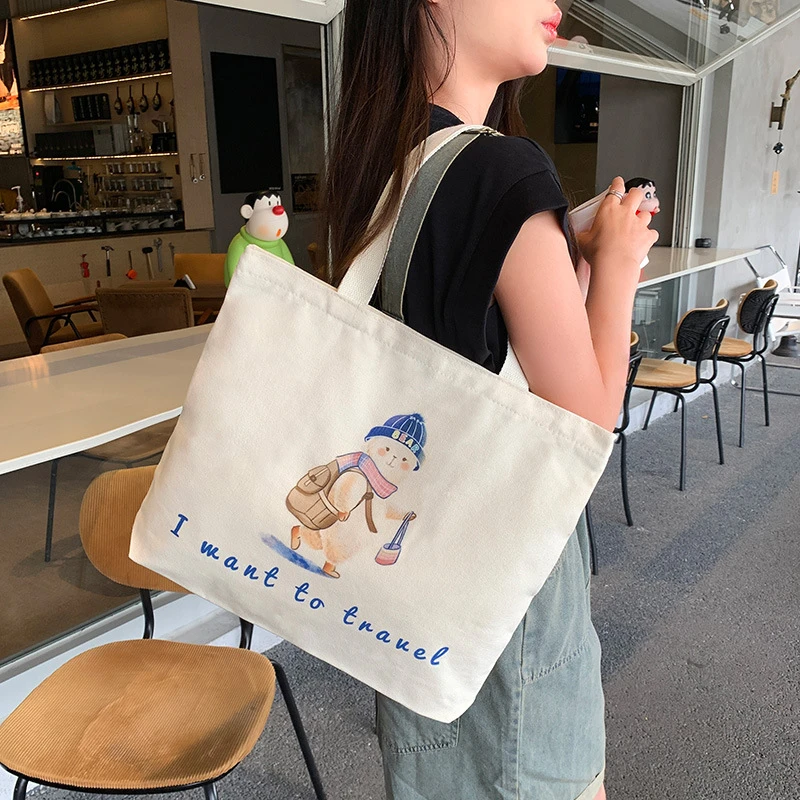 帆布包女2025大容量爆款手提包原创包包大学生单肩包批发卡通可爱