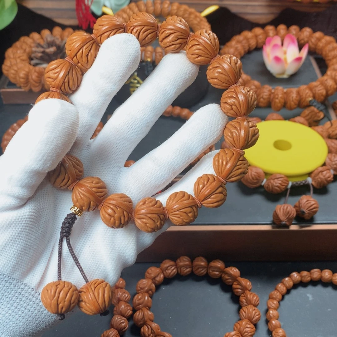 桃核吊坠18祥云手持g