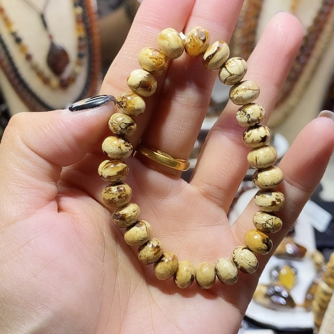 琥珀未镶嵌裸石干白花8mm