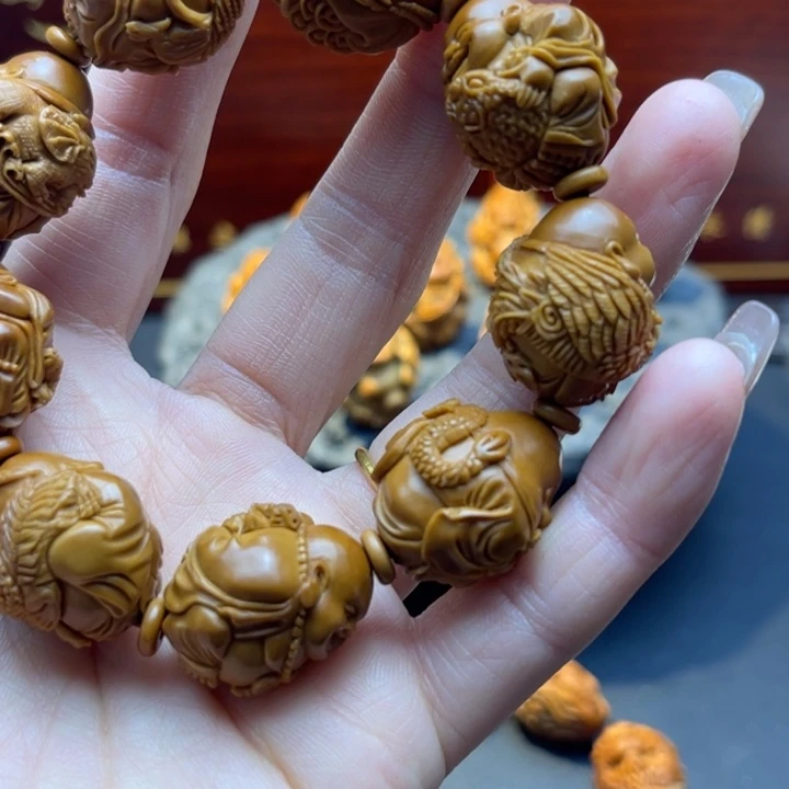 龙***伟橄榄核吊坠弥勒2.0