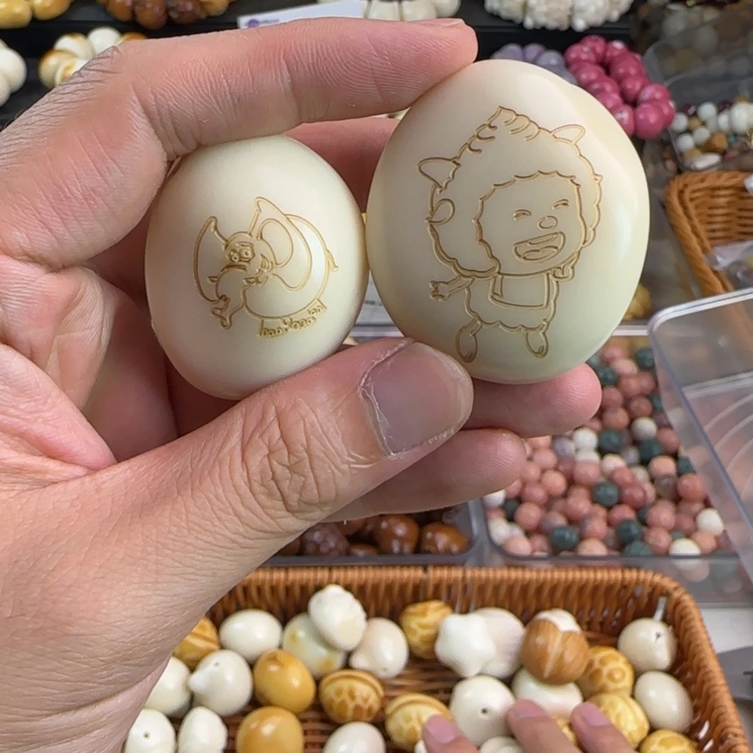 吊坠菩提根/象牙果手把件2颗通货