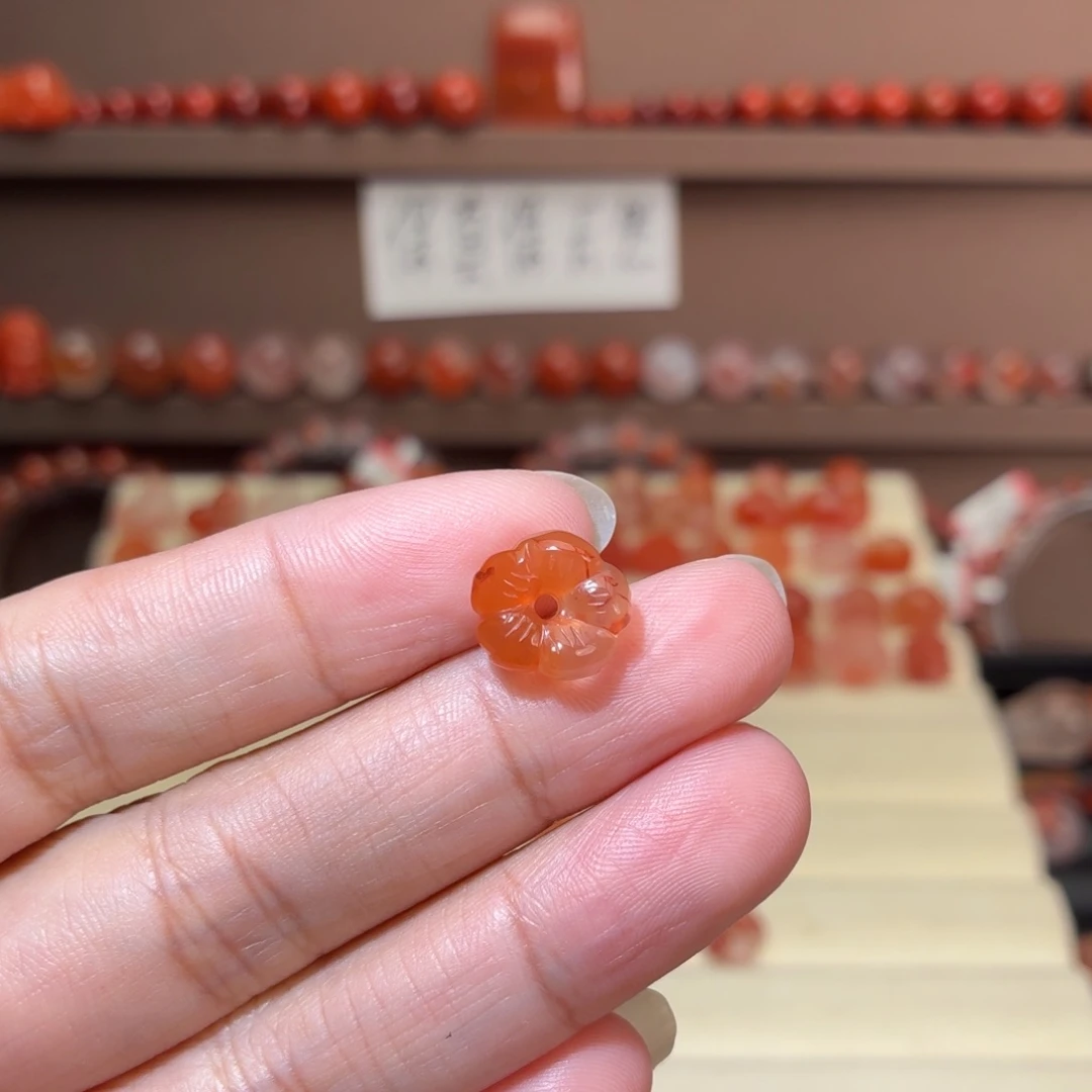 曲***谚南红玛瑙未镶嵌川料有钱花