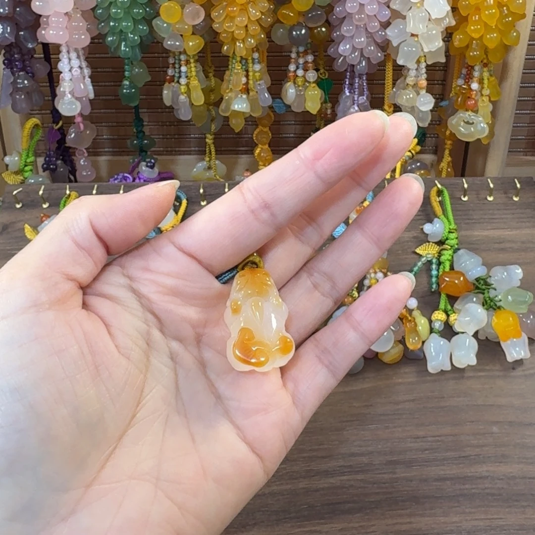 婷****玛瑙/玉髓未镶嵌钥匙挂件