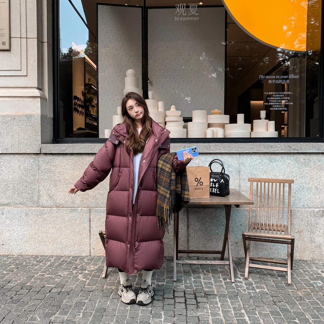 冬季加厚保暖95%白鸭绒时尚泡芙连帽休闲女士长款羽绒服Y24021