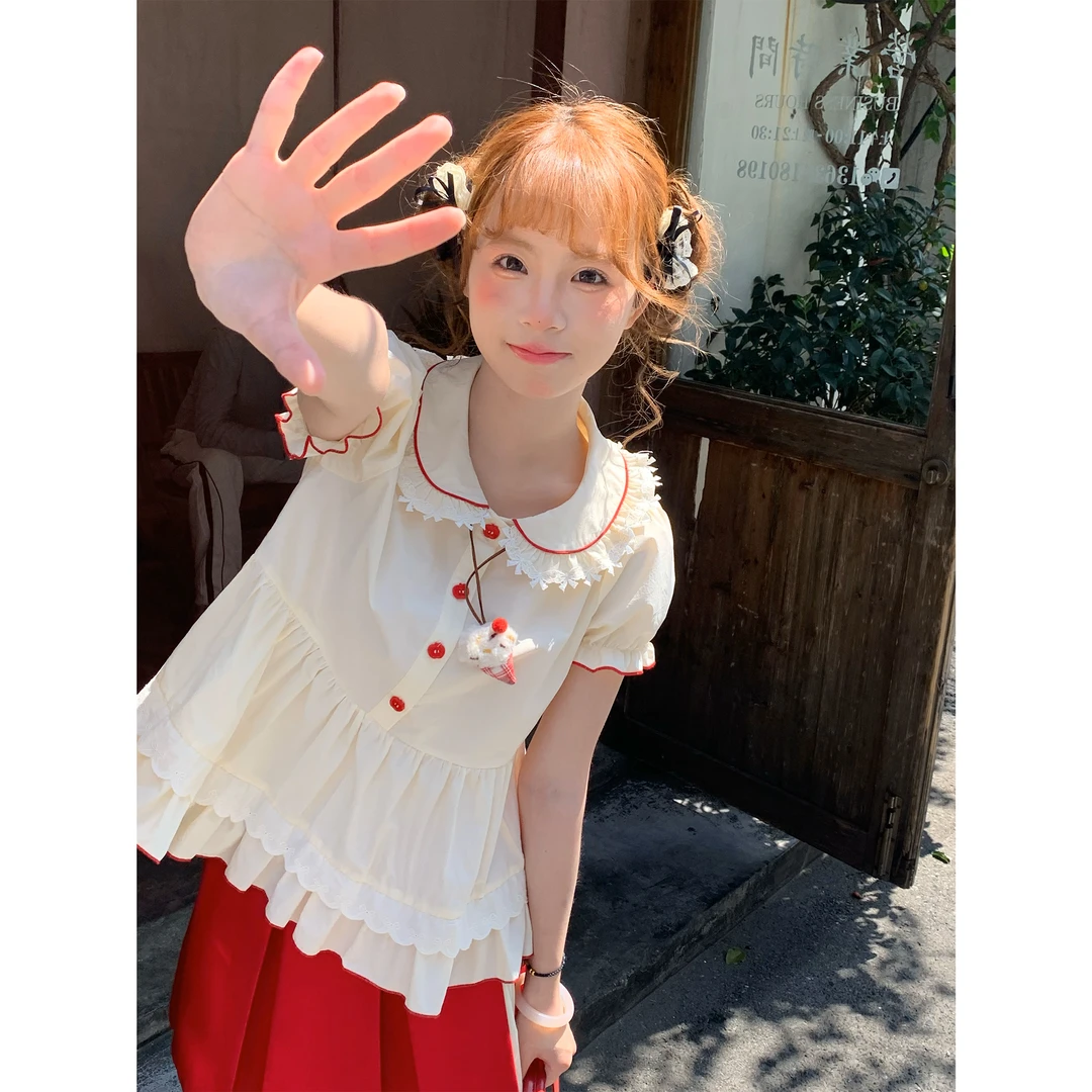 慕斯跳跳 sinsingirl 奶黄色娃娃领短袖上衣 红色半身裙套装