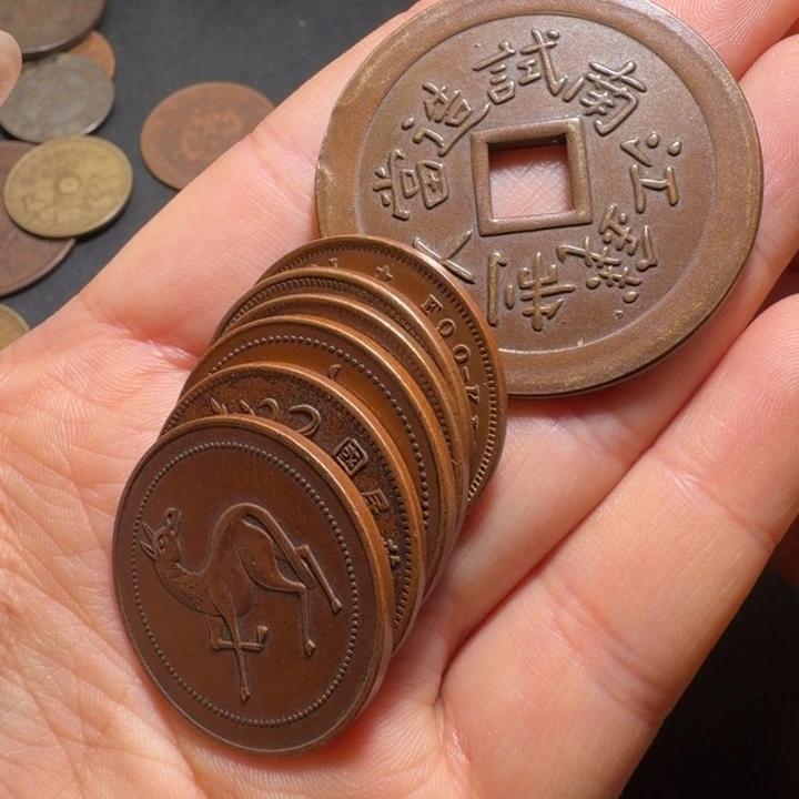 皮***蛋七个铜币工艺品摆件