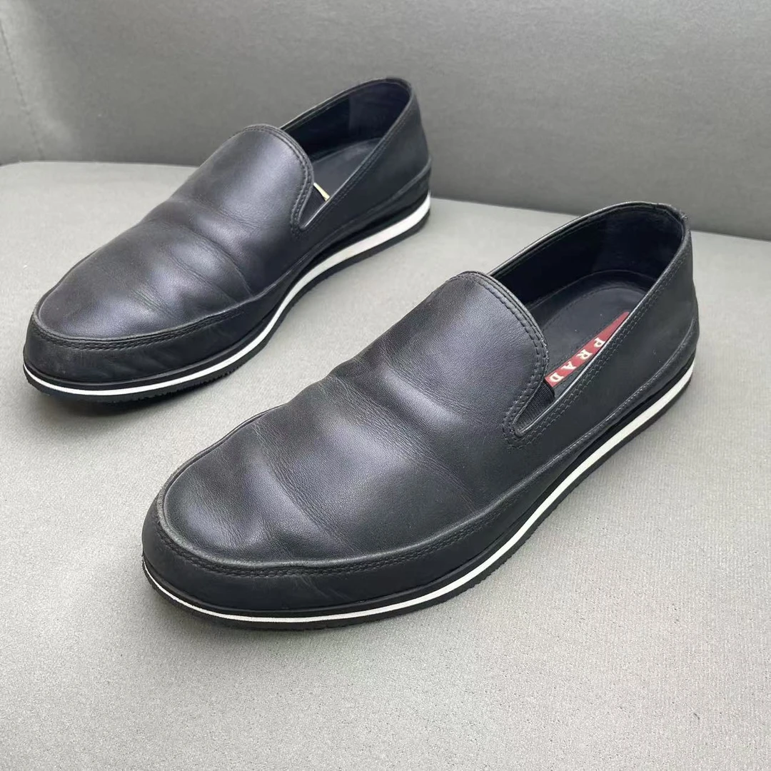 95新 Prada/普拉达 黑色时尚百搭皮革面一脚蹬 39码/福利款