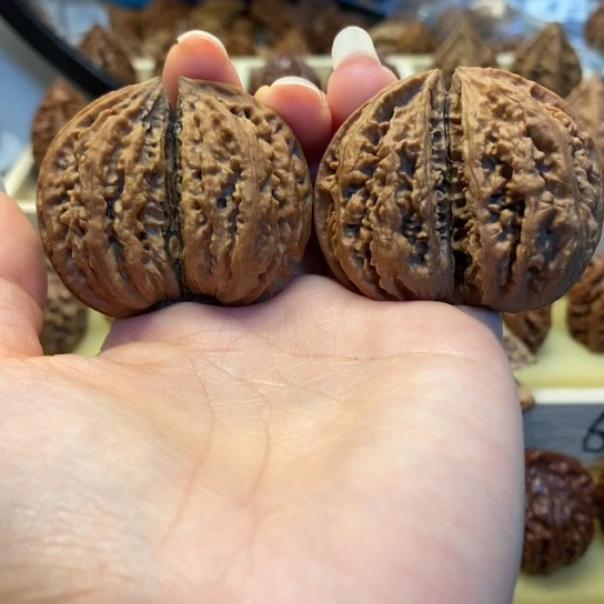 桃核把件蚂蚁纹双棒