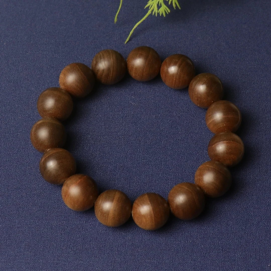 重器印度老山檀香1.5横纹黑肉沉水级别单圈手串多样性