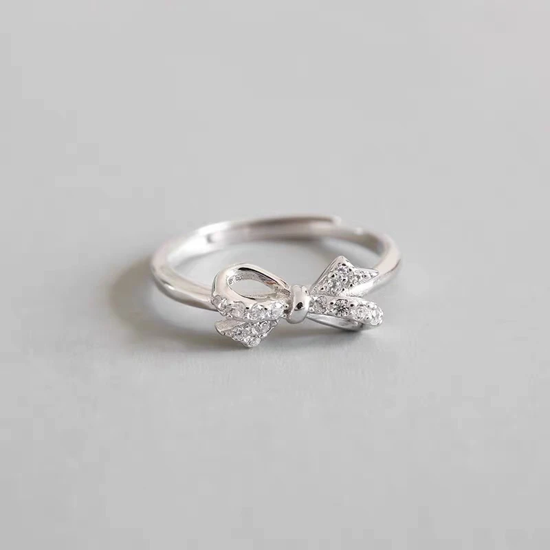 足银合成锆石戒指 微镶蝴蝶结足银990简约戒指女可调节纯银气质