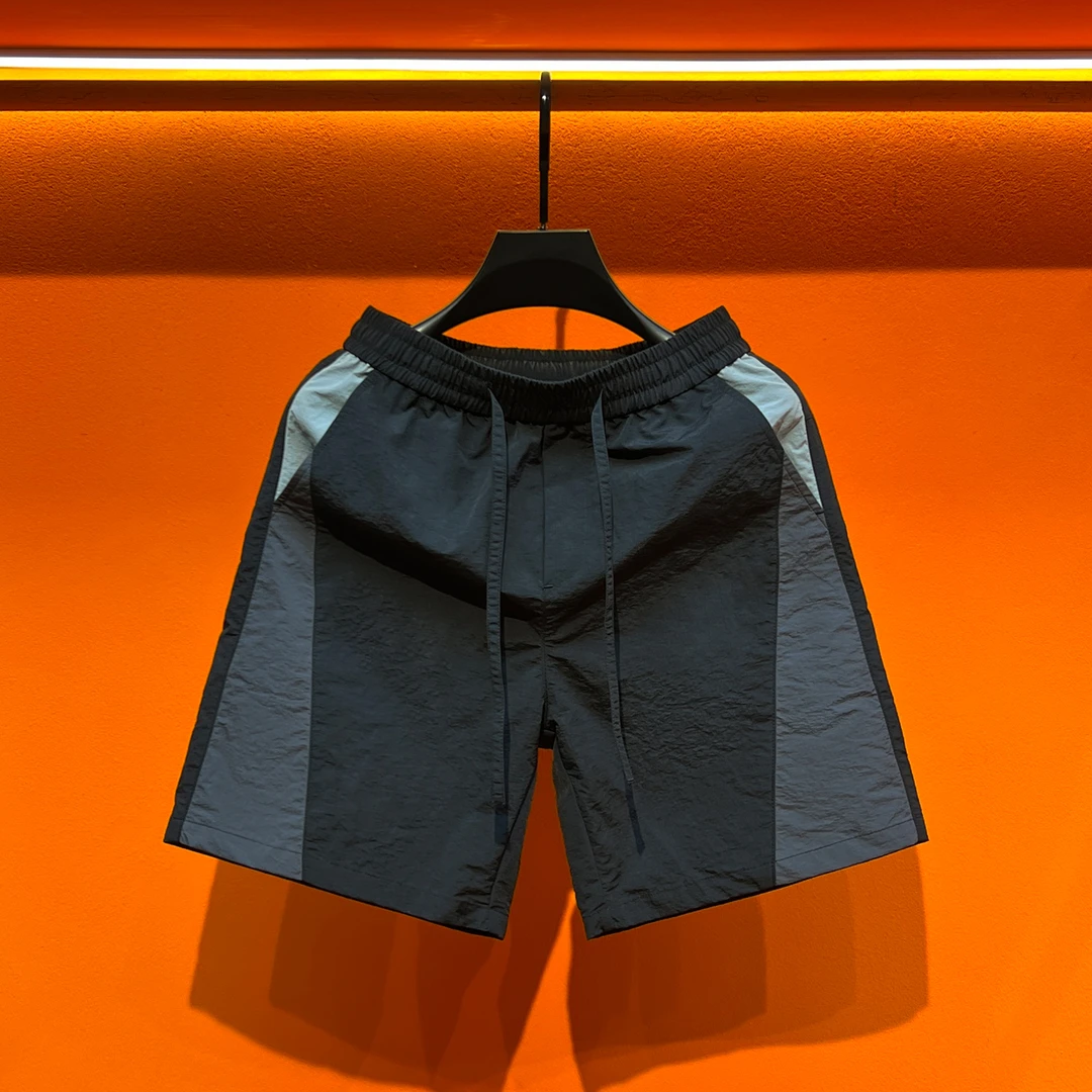 夏季潮牌拼接户外宽松短裤男士夏季薄款速干百搭五分裤外穿沙滩裤