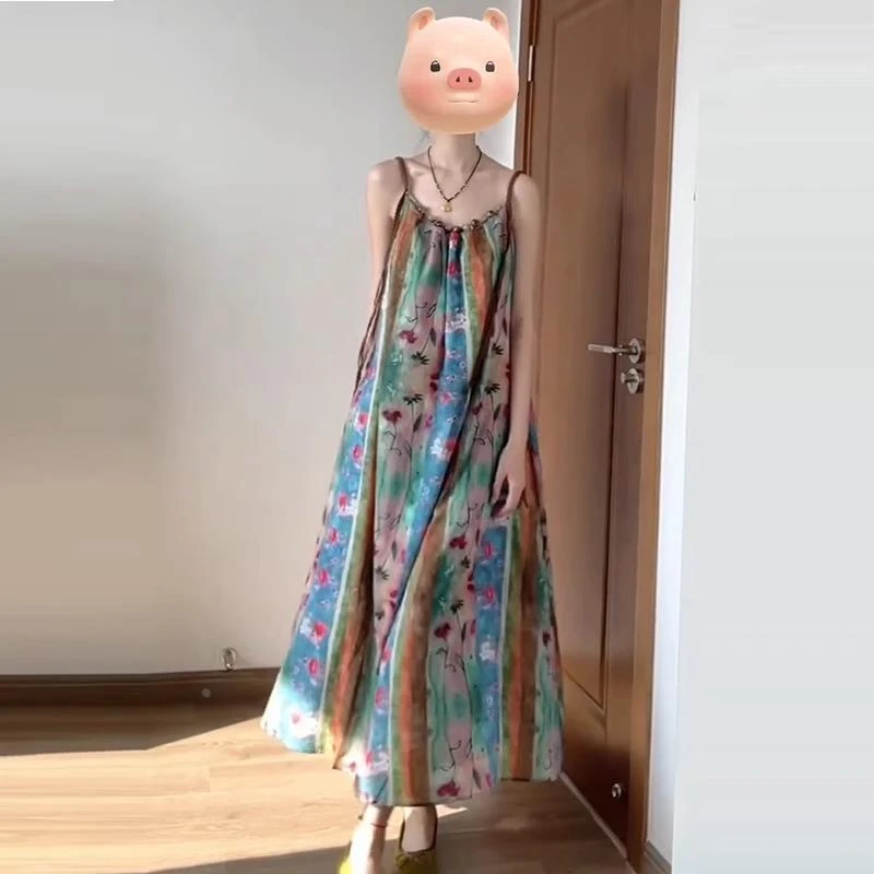 复古碎花吊带连衣裙女夏2025新款法式感小个子海边度假长裙子