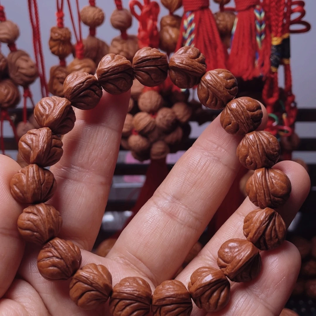 木质类龙纹桃枭手串