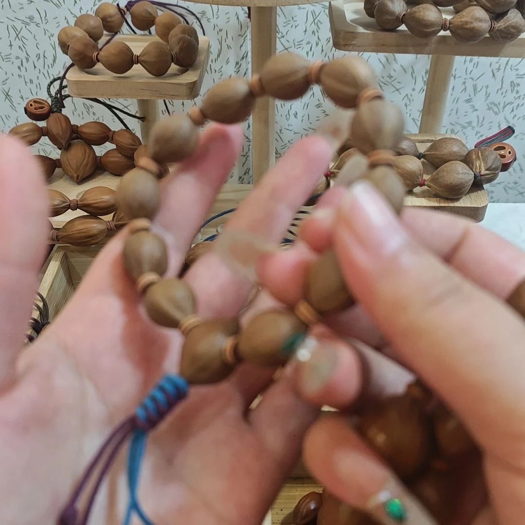 ****远橄榄核吊坠13+小金豆手串