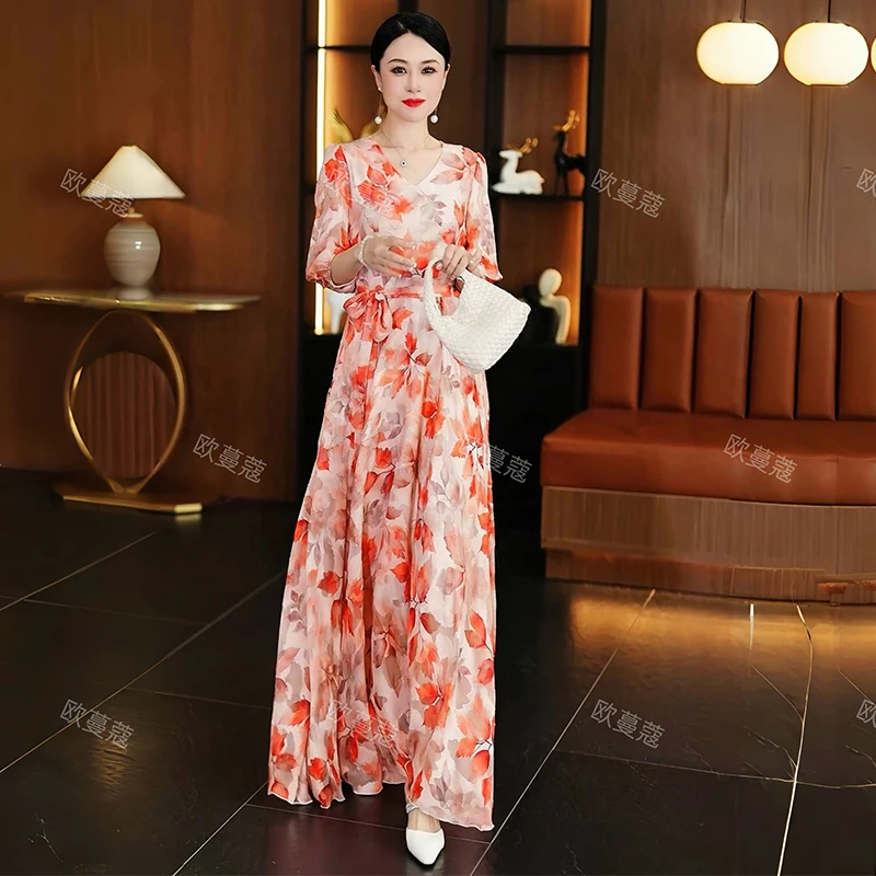 丹霞红提花连衣裙女2025年新款时尚气质显瘦过膝长款度假大摆裙子