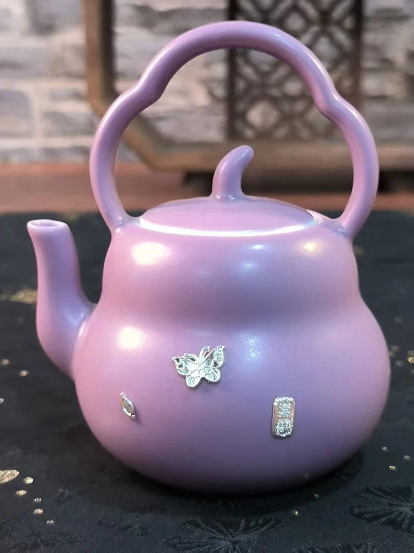 丁香紫锔钉蝴蝶提梁茶壶
