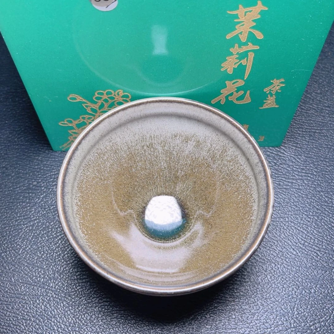 茶盏滴滴答答的声音响