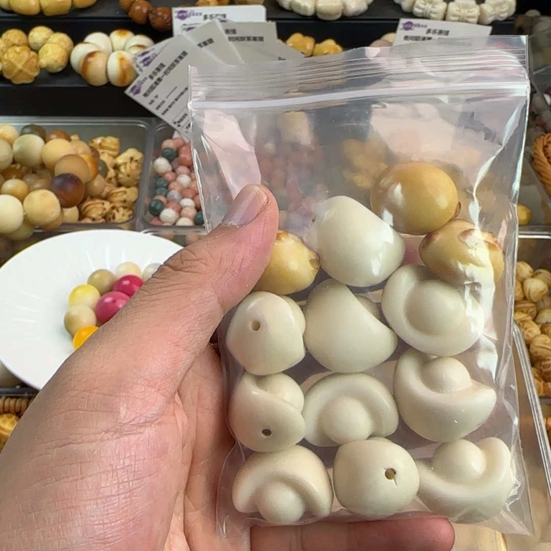 逝***l吊坠菩提根/象牙果瑕疵12颗混