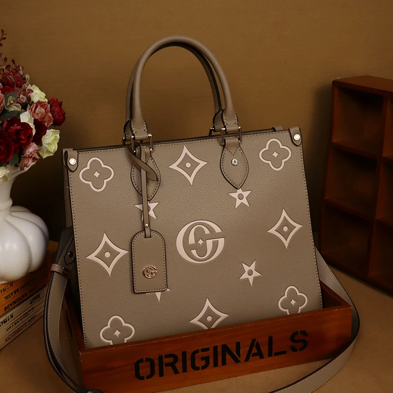 印花搭扣单肩包大托特城市游牧风气质轻奢时尚休闲百搭女士欧美包