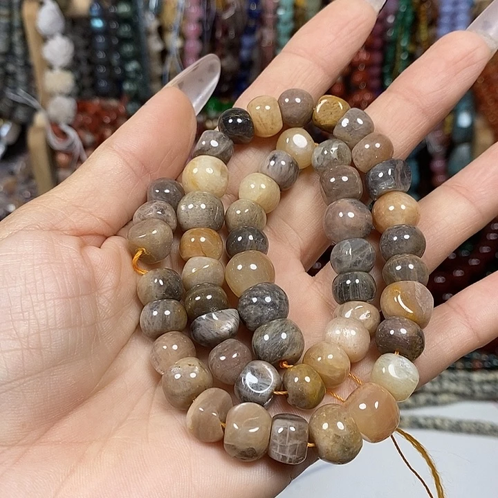 玛瑙/玉髓未镶嵌珠宝半成品天然黑骨干糖豆一条