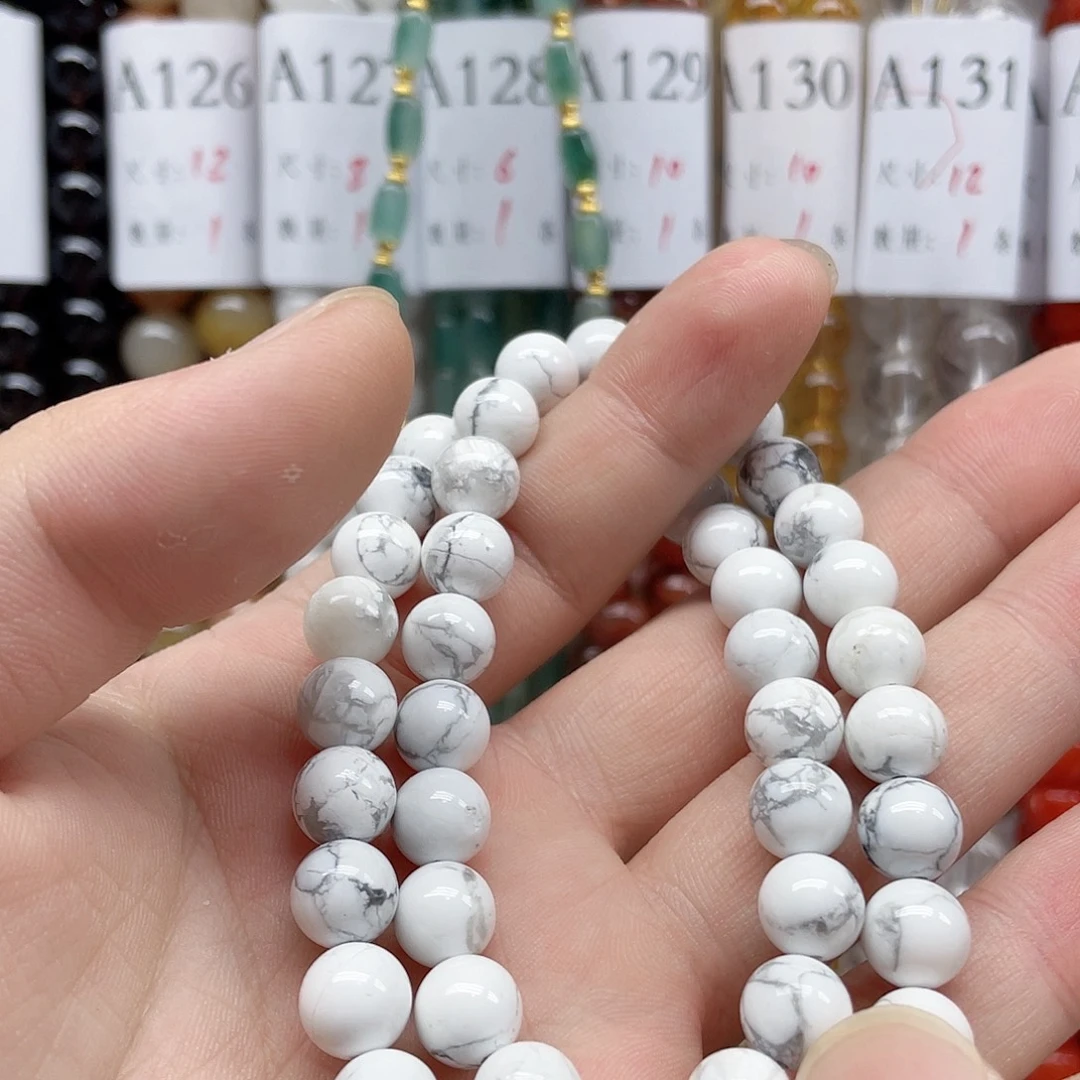 伊***妈玛瑙/玉髓合金珠宝半成品8mm一条