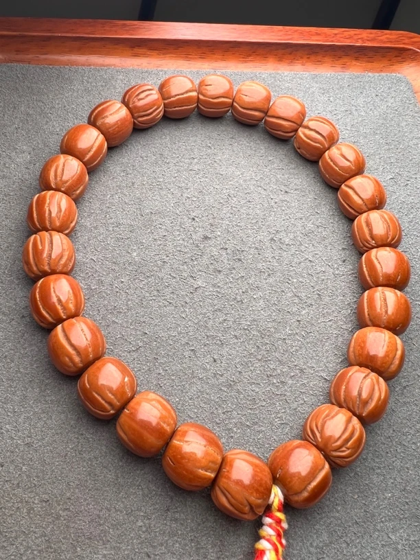 龙纹桃核小芽口二等品光珠手持13左右