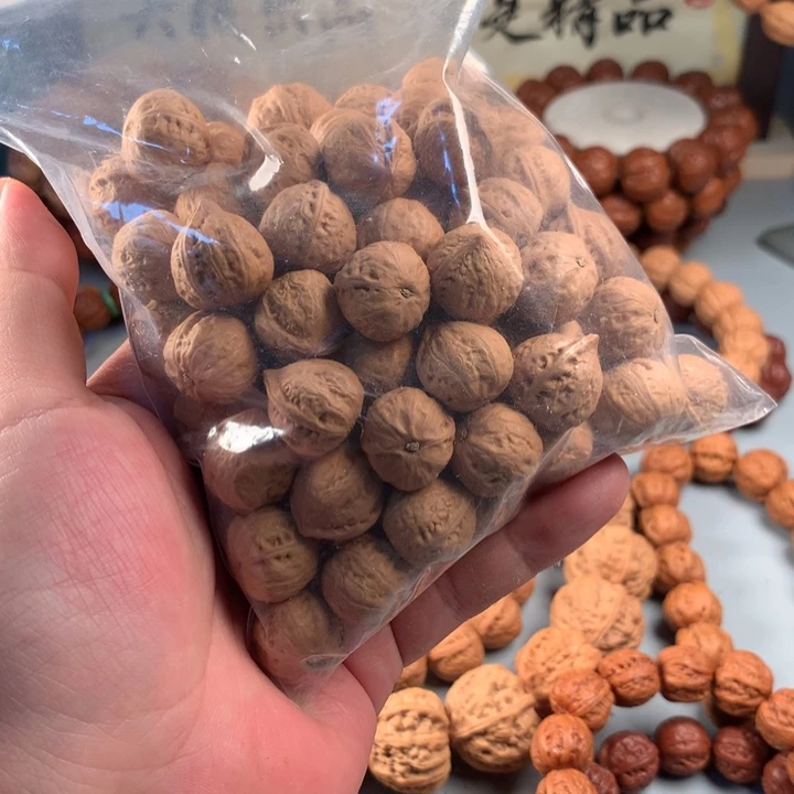 自***年文玩核桃吊坠假核