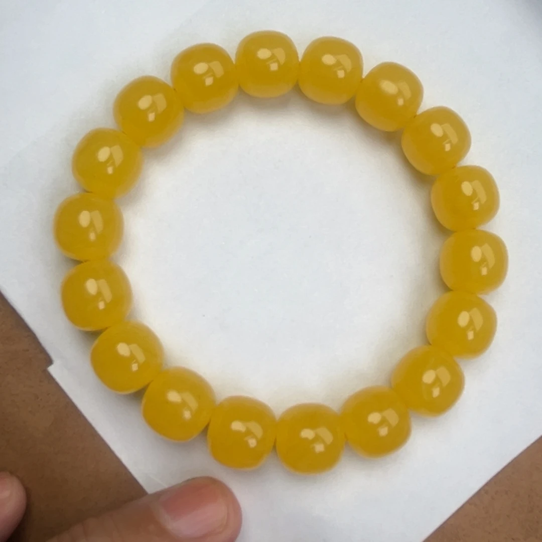 琥珀未镶嵌手串乌料焦皮同料橘红1212.8*12.2腕口18+