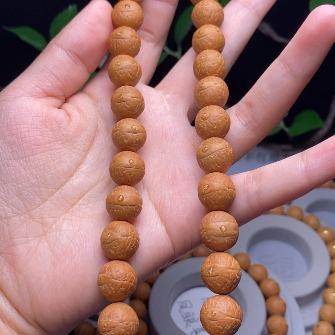 凤眼菩提吊坠12.5手持