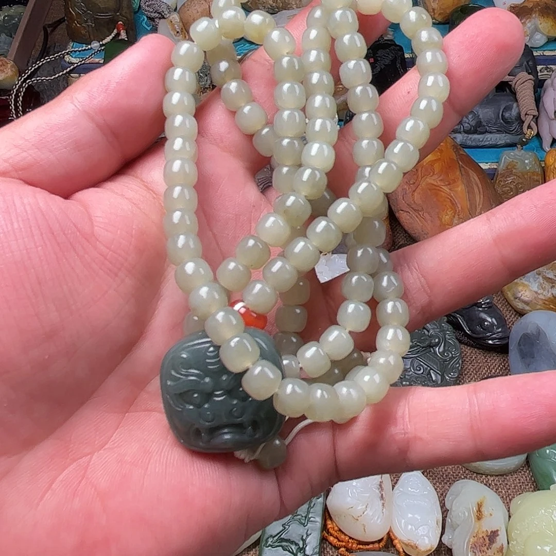 漠***人和田玉未镶嵌把件