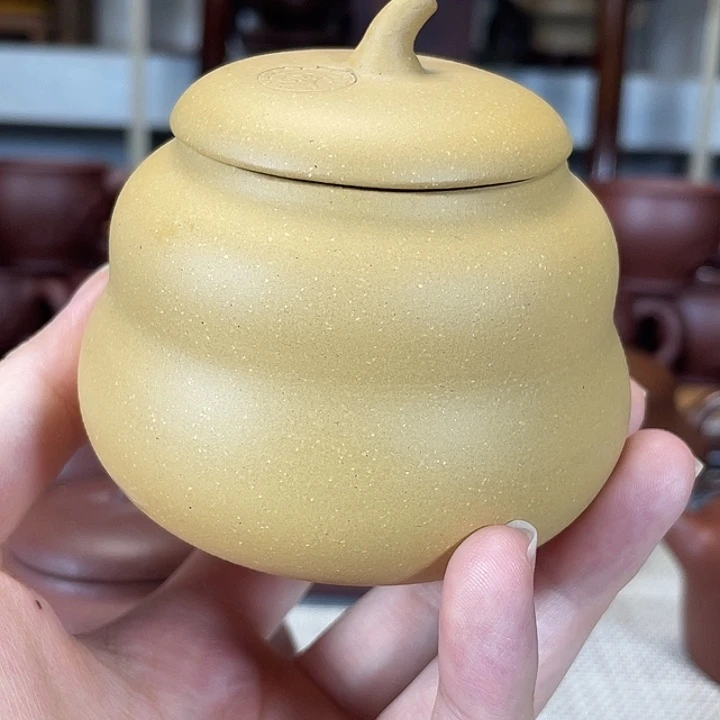 茶杯紫砂茶叶罐一个
