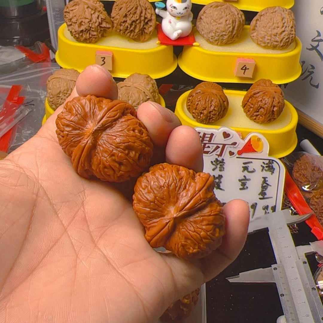 文玩核桃把件黄金定元宝