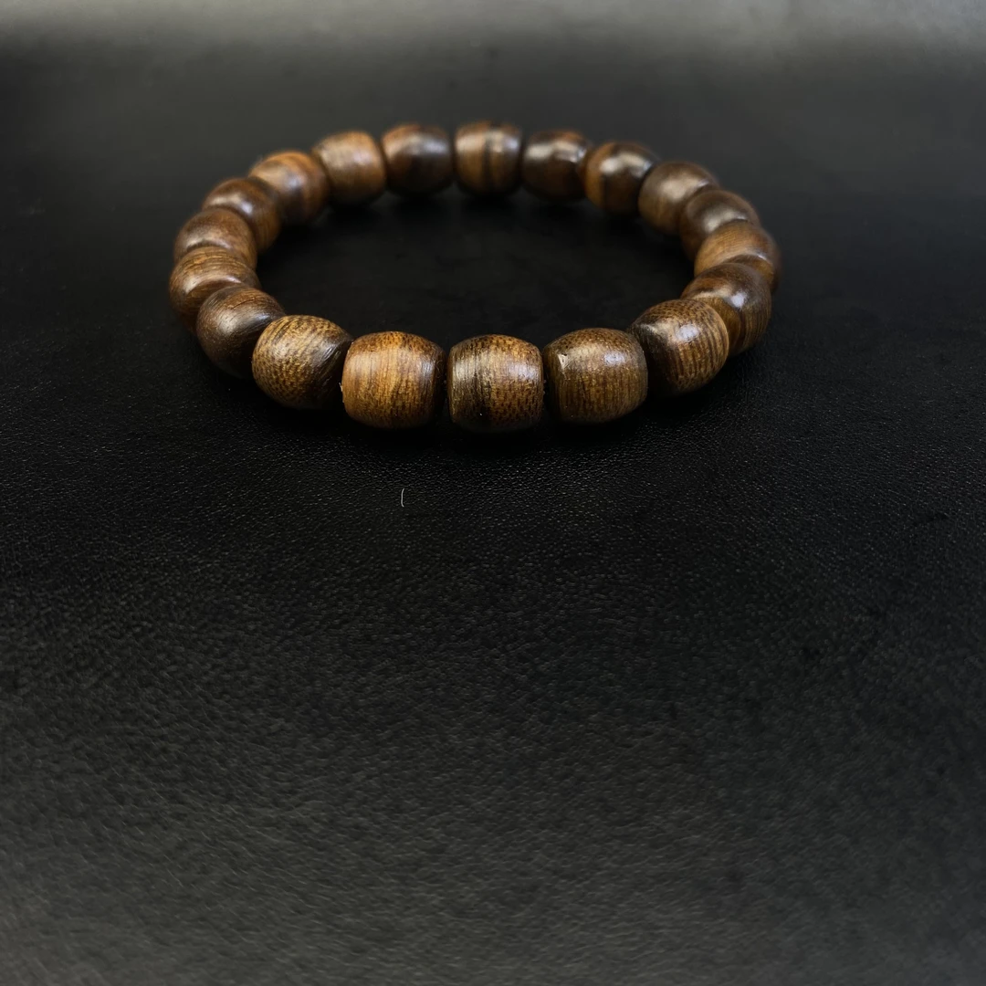 L016绿棋桶珠1.0九分沉单圈手串