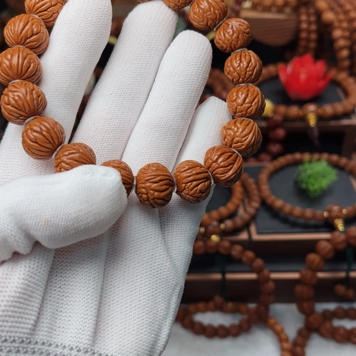 吊坠桃核15龙纹凤羽手串