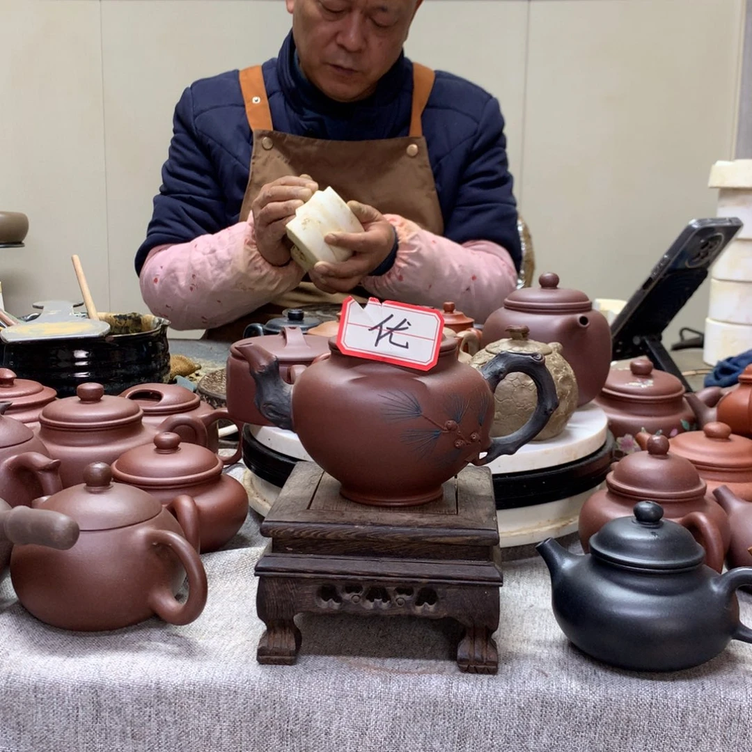 喜***梢紫泥茶壶松针报春300 c半手工制作