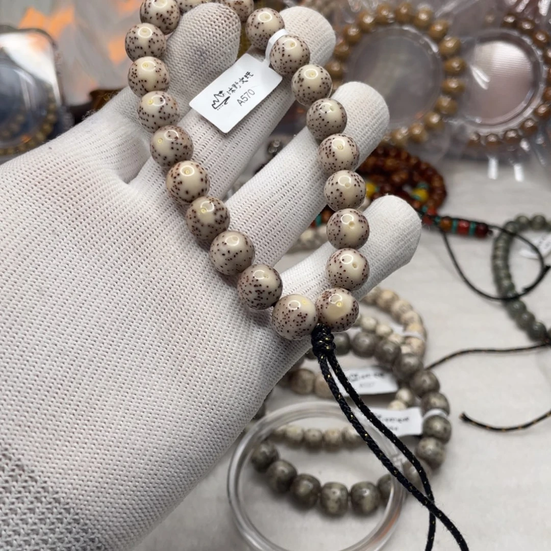 贾***毛星月菩提手串11mm骨瓷白跑道留白a570