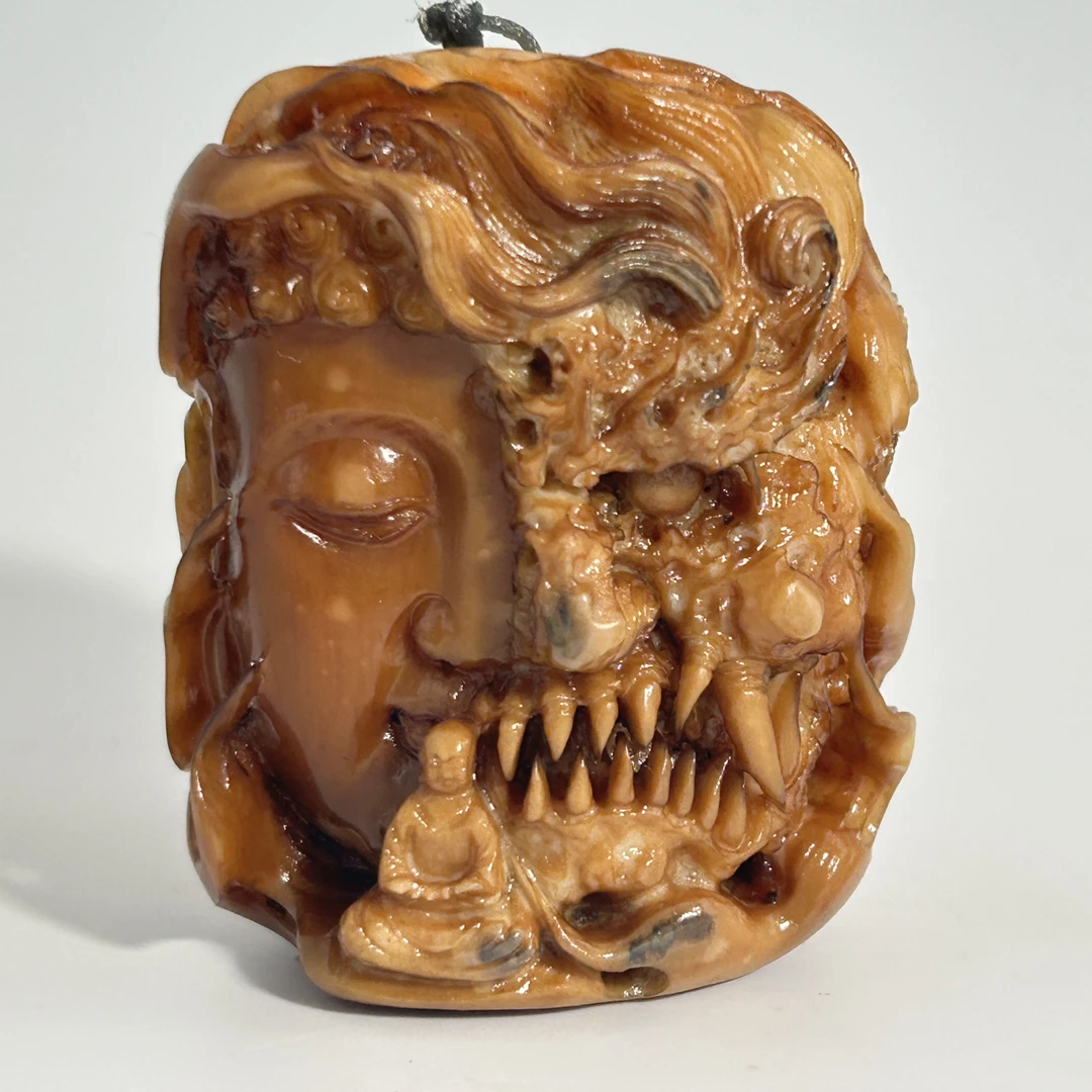 猛犸牙雕冰咖玉化佛魔一念把件53*43*32mm假一罚四X548