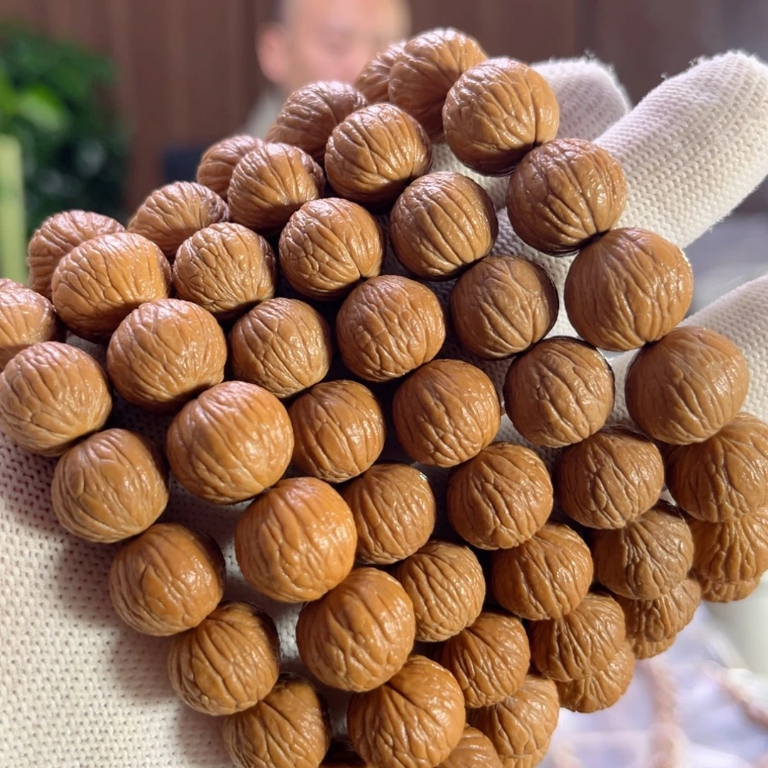 手串猴头核桃14+凤羽手串